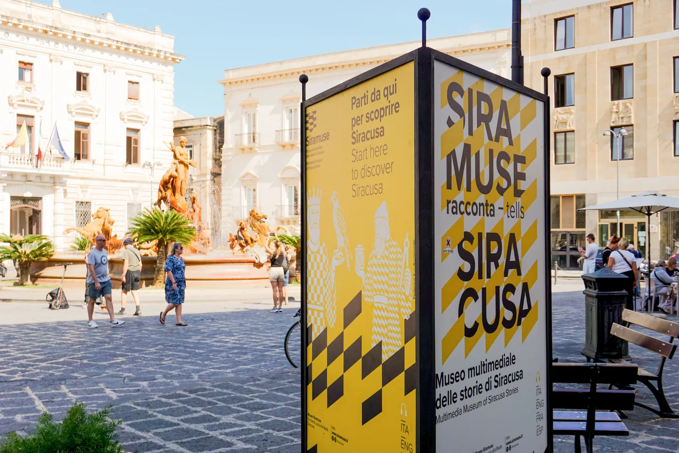 Yellow Siramuse totem in Piazza Archimede